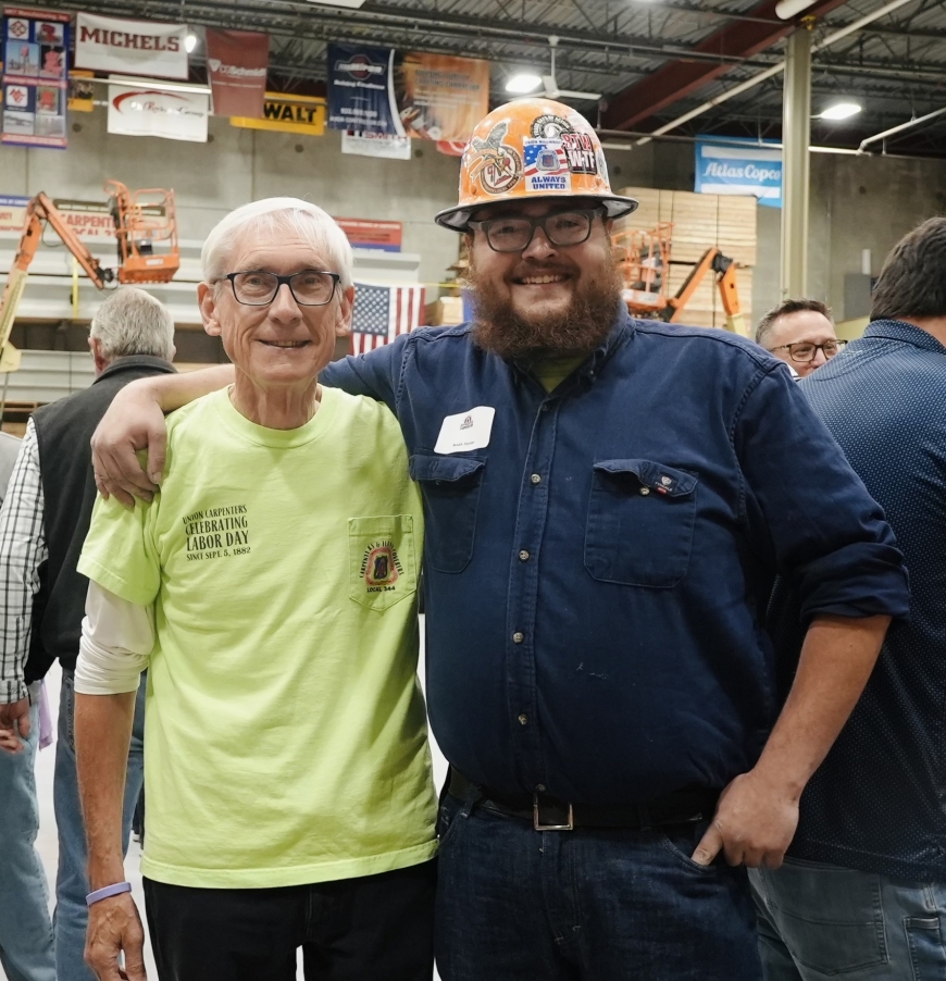 Noah Porter with Gov Evers